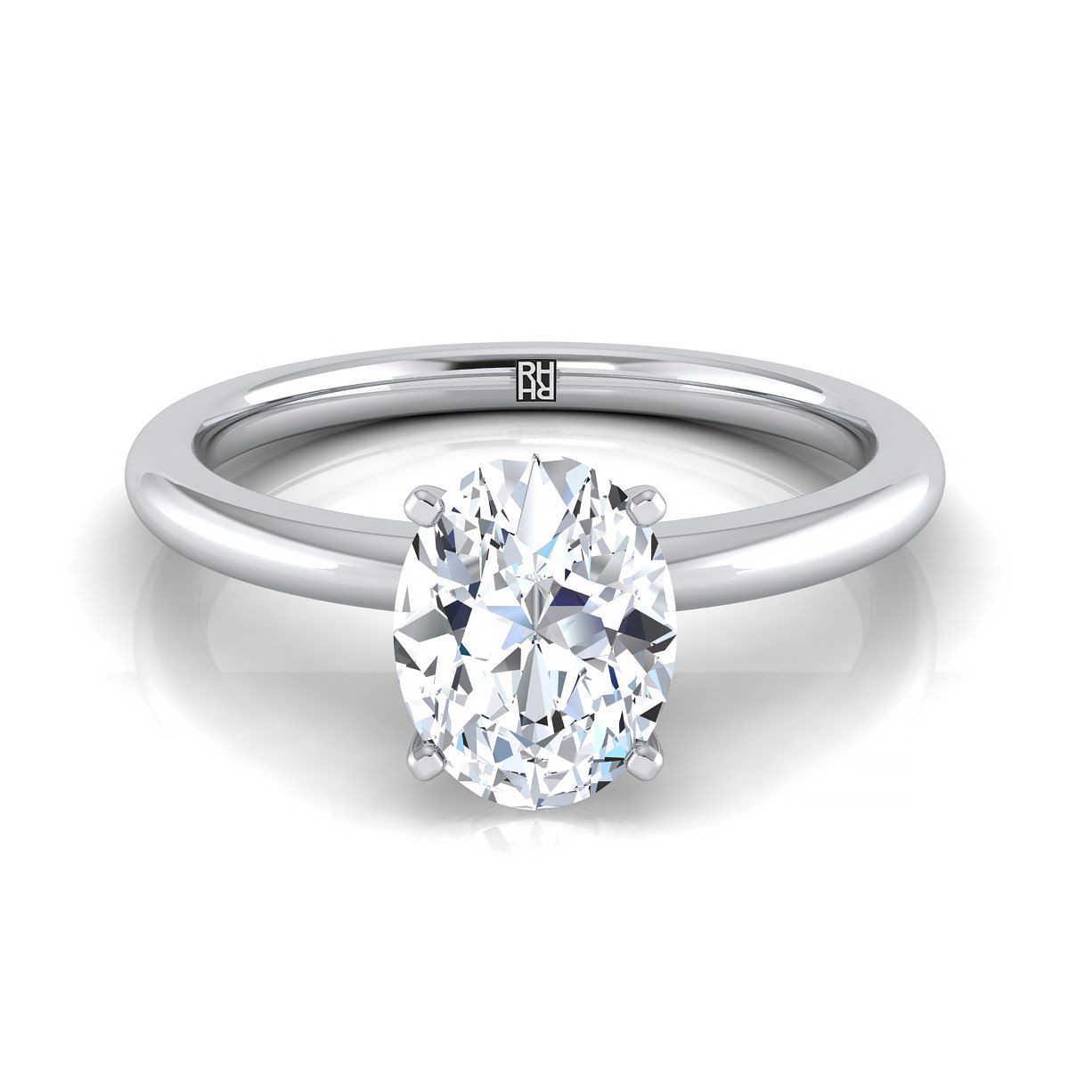 แหวนหมั้นแพลทินัมวงรีทรงกลม Comfort Fit Claw Prong Solitaire