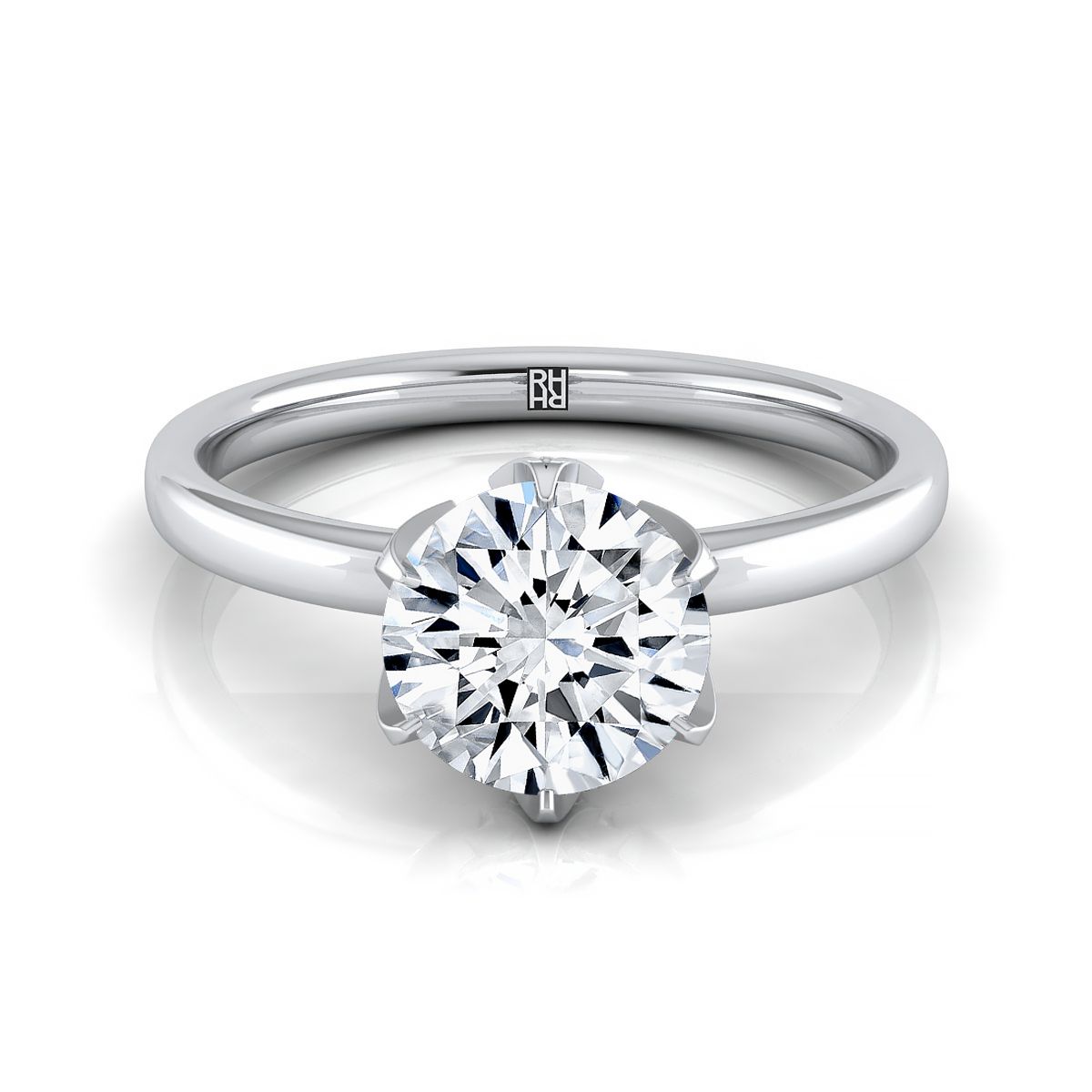 Platinum Round Brilliant Diamond Secret Stone Claw Prong Solitaire Engagement Ring